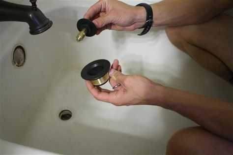 Металлическая пробка для ванной как вытащить