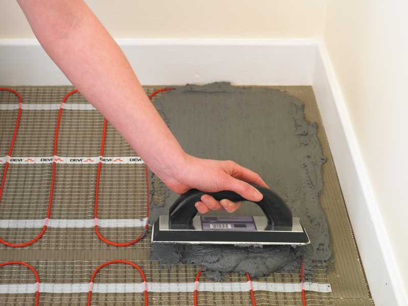 Укладка плитки на теплый пол: особенности, инструкция по этапам, нюансы, установка оборудования