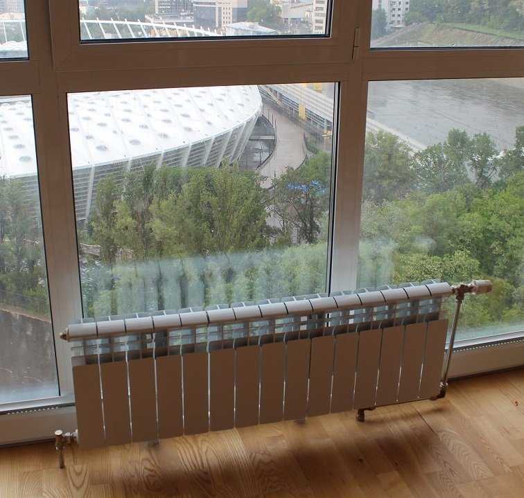 Низкие радиаторы отопления для панорамных окон: разновидности и их установка