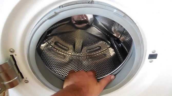 Барабан стиральной машины бьет током: причины, что делать